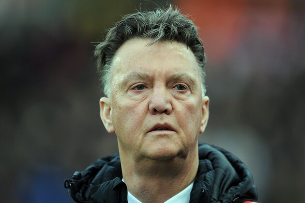 Manchester United's manager Louis van Gaal watches  their English Premier League soccer match against Stoke City at the Britannia Stadium in Stoke on Trent, England, Thursday Jan. 1, 2015. (AP Photo/Clint Hughes)