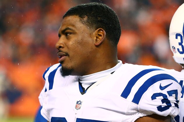 Jan 11, 2015; Denver, CO, USA; Indianapolis Colts running back Zurlon Tipton (37) against the Denver Broncos in the 2014 AFC Divisional playoff football game at Sports Authority Field at Mile High. The Colts defeated the Broncos 24-13. Mandatory Credit: Mark J. Rebilas-USA TODAY Sports