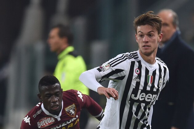 TURIN, ITALY - DECEMBER 16: Daniele Rugani (R) of FC Juventus in action against Afriyie Acquah of Torino FC during the TIM Cup match between FC Juventus and Torino FC at Juventus Arena on December 16, 2015 in Turin, Italy. (Photo by Valerio Pennicino/Getty Images) TURIN, ITALY - DECEMBER 16: Daniele Rugani (R) of FC Juventus in action against Afriyie Acquah of Torino FC during the TIM Cup match between FC Juventus and Torino FC at Juventus Arena on December 16, 2015 in Turin, Italy. (Photo by Valerio Pennicino/Getty Images)