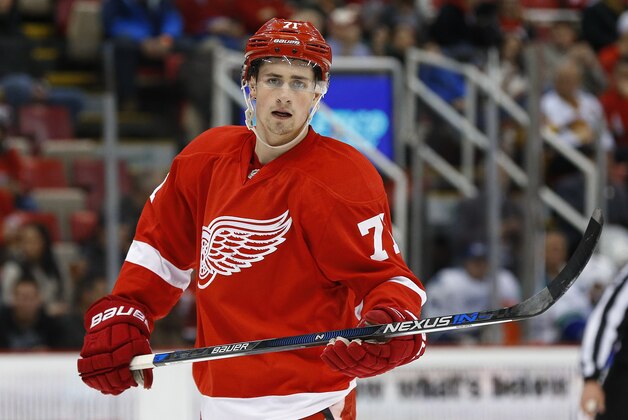 Detroit Red Wings center Dylan Larkin (71) plays against the Vancouver Canucks in the first period of an NHL hockey game Friday, Dec. 18, 2015 in Detroit. (AP Photo/Paul Sancya)