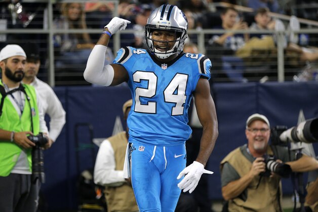 Carolina Panthers' Josh Norman gestures in the end zone after breaking up a pass intended for Dallas Cowboys' Dez Bryant during the second half of an NFL football game, Thursday, Nov. 26, 2015, in Arlington, Texas. (AP Photo/Brandon Wade)