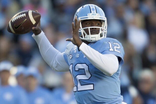 North Carolina quarter back Marquise Williams drops back to pass during the first half of an NCAA college football game, in Chapel Hill, N.C., Saturday, Nov. 14, 2015. (AP Photo/Rob Brown)