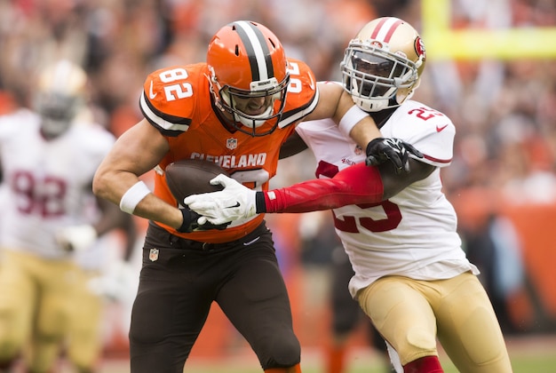 Dec 13, 2015; Cleveland, OH, USA; Cleveland Browns tight end Gary Barnidge (82) gets tackled by San Francisco 49ers strong safety Jaquiski Tartt (29) following a first down reception during the first quarter at FirstEnergy Stadium. Mandatory Credit: Scott R. Galvin-USA TODAY Sports Dec 13, 2015; Cleveland, OH, USA; Cleveland Browns tight end Gary Barnidge (82) gets tackled by San Francisco 49ers strong safety Jaquiski Tartt (29) following a first down reception during the first quarter at FirstEnergy Stadium. Mandatory Credit: Scott R. Galvin-USA TODAY Sports