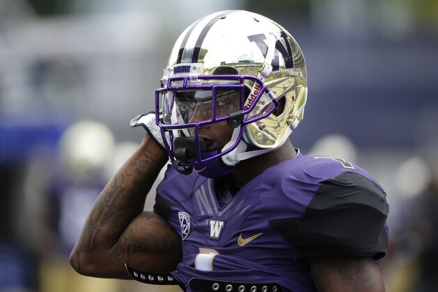 Washington's Jaydon Mickens stands on the sideline before an NCAA college football game against Utah State, Saturday, Sept. 19, 2015, in Seattle. (AP Photo/Ted S. Warren)