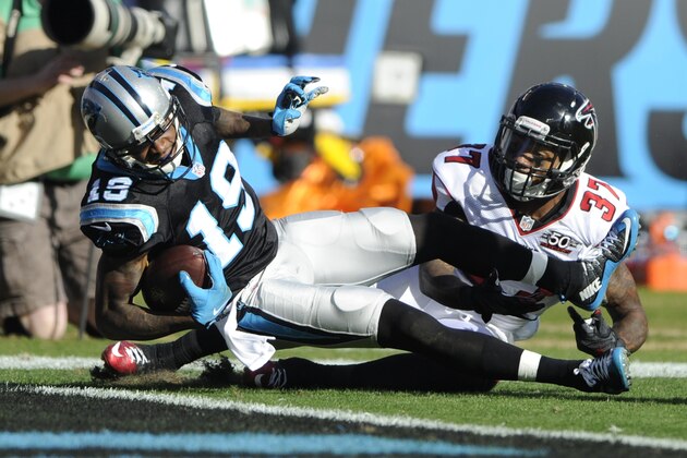 Carolina Panthers' Ted Ginn (19) runs through the tackle of Atlanta Falcons' Ricardo Allen (37) for a touchdown in the first half of an NFL football game in Charlotte, N.C., Sunday, Dec. 13, 2015. (AP Photo/Mike McCarn)