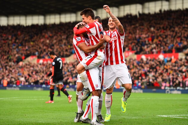 STOKE ON TRENT, ENGLAND - DECEMBER 26:  Bojan Krkic of Stoke City celebrates with team-mates, including Marko Arnautovic of Stoke City, after scoring the opening goal during the Barclays Premier League match between Stoke City and Manchester United at Britannia Stadium on December 26, 2015 in Stoke on Trent, England.  (Photo by Laurence Griffiths/Getty Images)