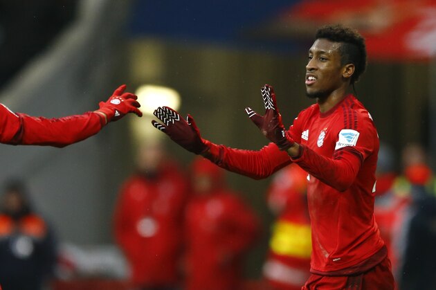 Bayern’s Kingsley Coman celebrates after scoring his side's second goal during the German Bundesliga soccer match between FC Bayern Munich and Hertha BSC Berlin at the Allianz Arena stadium in Munich, Germany, Saturday, Nov. 28, 2015. (AP Photo/Matthias Schrader)