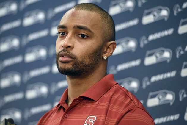 Seattle Seahawks wide receiver Doug Baldwin speaks during a news conference after an NFL football game against the Baltimore Ravens, Sunday, Dec. 13, 2015, in Baltimore. The Seahawks won 35-6. (AP Photo/Nick Wass)