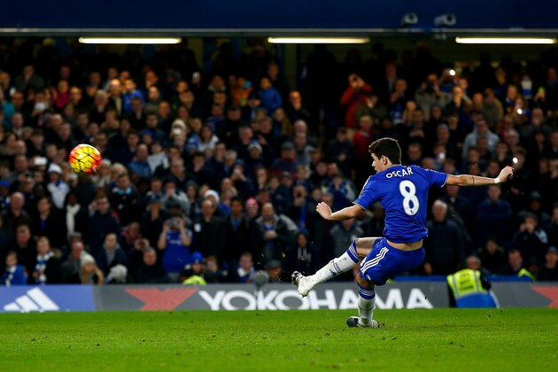 LONDON, ENGLAND - DECEMBER 26:  Oscar of Chelsea watches the ball fly over the bar as he slips taking a penalty during the Barclays Premier League match between Chelsea and Watford at Stamford Bridge on December 26, 2015 in London, England.  (Photo by Clive Rose/Getty Images)