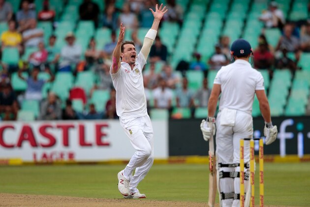 South Africa's bowler Dale Steyn (L) celebrates after dismissing England's batsman James Taylor (R) during the first day of the cricket Test match between England and South Africa at the the Kingsmead stadium on December 26, 2015 in Durban. / AFP / GIANLUIGI GUERCIA        (Photo credit should read GIANLUIGI GUERCIA/AFP/Getty Images)