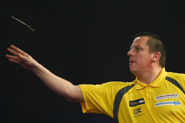 LONDON, ENGLAND - DECEMBER 22:  Dave Chisnall in action during his match against Rowby-John Rodrigues during the 2016 William Hill PDC World Darts Championships on Day Five at Alexandra Palace on December 22, 2015 in London, England.  (Photo by Ian Walton/Getty Images)