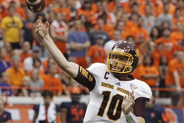 Central Michigan’s Cooper Rush throws a pass in the second quarter of an NCAA college football game against Syracuse in Syracuse, N.Y., Saturday, Sept. 19, 2015. (AP Photo/Nick Lisi)