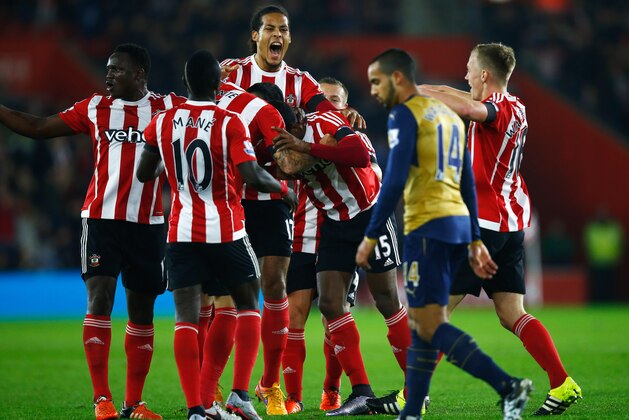 SOUTHAMPTON, ENGLAND - DECEMBER 26:  Cuco Martina of Southampton (15) celebrates with team mates as he scores their first goal with a long range shot during the Barclays Premier League match between Southampton and Arsenal at St Mary's Stadium on December 26, 2015 in Southampton, England.  (Photo by Christopher Lee/Getty Images)
