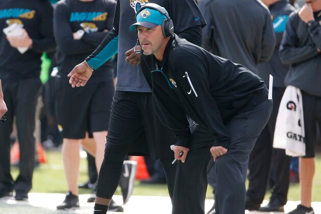 Jacksonville Jaguars head coach Gus Bradley watches his team play against the Atlanta Falcons during the first half of an NFL football game in Jacksonville, Fla., Sunday, Dec. 20, 2015. (AP Photo/Stephen B. Morton)
