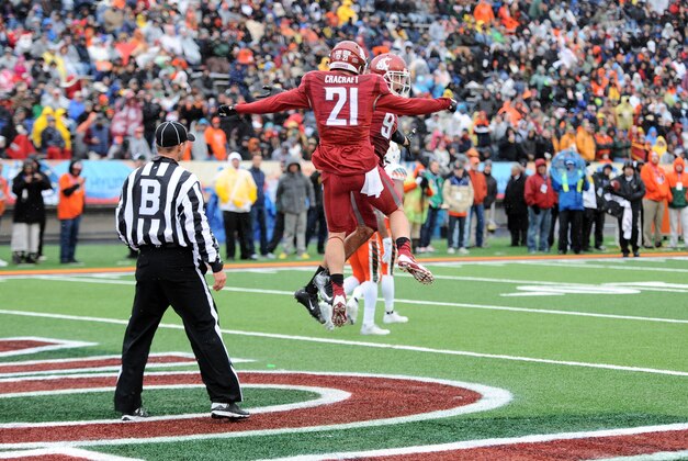 Dec 26, 2015; El Paso, TX, USA; Washington State Cougars wide receiver Gabe Marks (9) celebrates a touchdown catch against the Miami Hurricanes during the first half at Sun Bowl Stadium. Mandatory Credit: Joe Camporeale-USA TODAY Sports