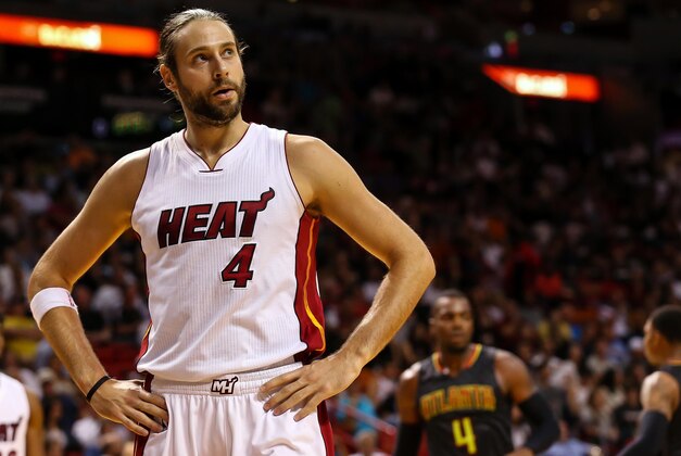 Nov 3, 2015; Miami, FL, USA; Miami Heat forward Josh McRoberts (4) reacts after fouling Atlanta Hawks forward Paul Millsap (4) during the second half at American Airlines Arena. The Hawks won 98-92. Mandatory Credit: Steve Mitchell-USA TODAY Sports