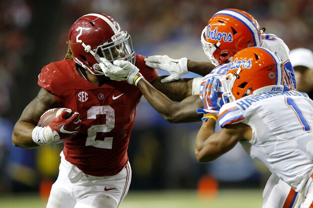 ATLANTA, GA - DECEMBER 5: Running back Derrick Henry #2 of the Alabama Crimson Tide carries the ball against defensive back Marcus Maye #20 of the Florida Gators in the fourth quarter during the SEC Championship at the Georgia Dome on December 5, 2015 in Atlanta, Georgia. (Photo by Kevin C. Cox/Getty Images)