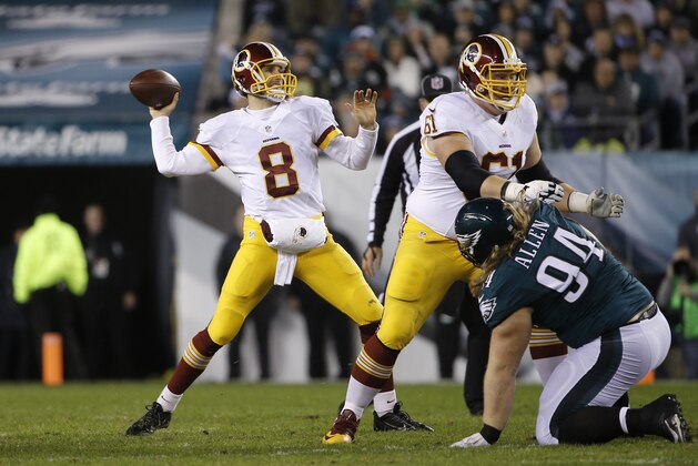 Washington Redskins' Kirk Cousins in action in the first half of an NFL football game against the Philadelphia Eagles, Saturday, Dec. 26, 2015, in Philadelphia.  (AP Photo/Matt Rourke)