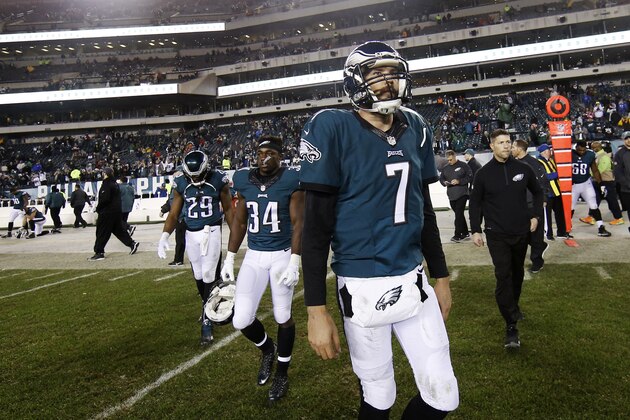 Philadelphia Eagles' Sam Bradford walks onto the field after an NFL football game against the Washington Redskins, Saturday, Dec. 26, 2015, in Philadelphia. Washington won 38-24. (AP Photo/Michael Perez)