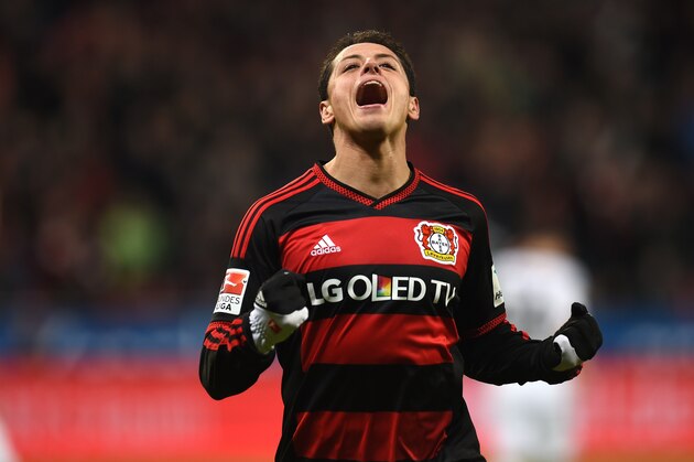 Leverkusen's Mexican striker Javier Hernandez celebrates during the German first division Bundesliga football match Bayer 04 Leverkusen vs Borussia Moenchengladbach in Leverkusen, western Germany, on December 12, 2015. 
AFP PHOTO / PATRIK STOLLARZ

RESTRICTIONS: DURING MATCH TIME: DFL RULES TO LIMIT THE ONLINE USAGE TO 15 PICTURES PER MATCH AND FORBID IMAGE SEQUENCES TO SIMULATE VIDEO. == RESTRICTED TO EDITORIAL USE == FOR FURTHER QUERIES PLEASE CONTACT DFL DIRECTLY AT + 49 69 650050. / AFP / PATRIK STOLLARZ        (Photo credit should read PATRIK STOLLARZ/AFP/Getty Images)