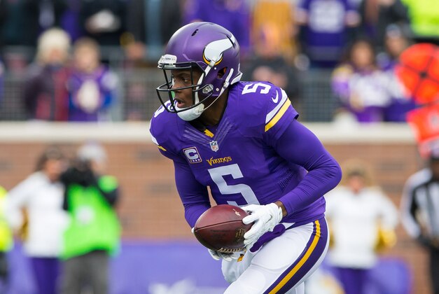 Dec 20, 2015; Minneapolis, MN, USA; Minnesota Vikings quarterback Teddy Bridgewater (5) hands the ball off in the first quarter against the Chicago Bears at TCF Bank Stadium. Mandatory Credit: Brad Rempel-USA TODAY Sports