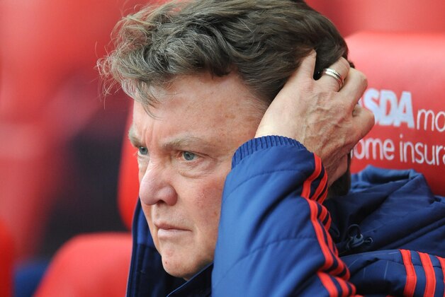 Manchester United manager Louis van Gaal watches from the bench during the English Premier League soccer match between Stoke City and Manchester United at the Britannia Stadium, Stoke on Trent, England, Saturday, Dec. 26, 2015. (AP Photo/Rui Vieira)