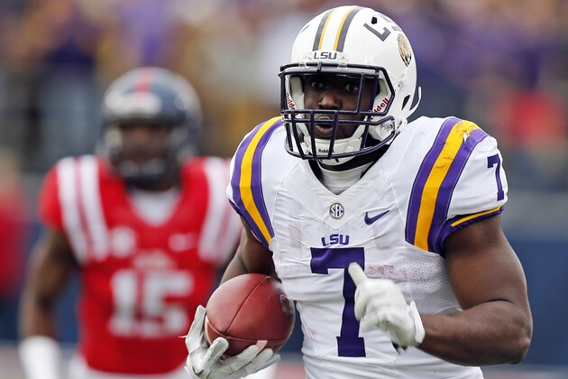 LSU running back Leonard Fournette (7) runs past Mississippi defensive back Kendarius Webster (15) for a long gain in the first half of an NCAA college football game in Oxford, Miss., Saturday, Nov. 21, 2015. (AP Photo/Rogelio V. Solis)