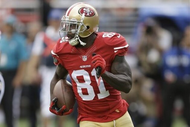 FILE - San Francisco 49ers wide receiver Anquan Boldin (81) runs against the Baltimore Ravens during the first half of an NFL football game in Santa Clara, Calif. The 49ers will play against the Detroit Lions on Sunday, Dec. 27, 2015. (AP Photo/Ben Margot, file)