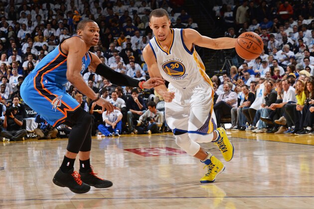 OAKLAND, CA - JANUARY 5:  Stephen Curry #30 of the Golden State Warriors handles the ball against Russell Westbrook #0 of the Oklahoma City Thunder during the game on January 5, 2015 at Oracle Arena in Oakland, California. NOTE TO USER: User expressly acknowledges and agrees that, by downloading and or using this photograph, user is consenting to the terms and conditions of Getty Images License Agreement. Mandatory Copyright Notice: Copyright 2015 NBAE (Photo by Noah Graham/NBAE via Getty Images)