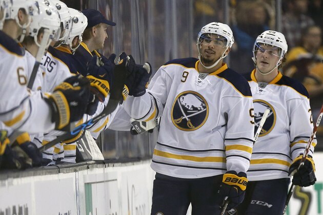 Buffalo Sabres' Evander Kane (9) celebrates his goal during the second period of an NHL hockey game against the Boston Bruins in Boston, Saturday, Dec. 26, 2015. (AP Photo/Michael Dwyer)