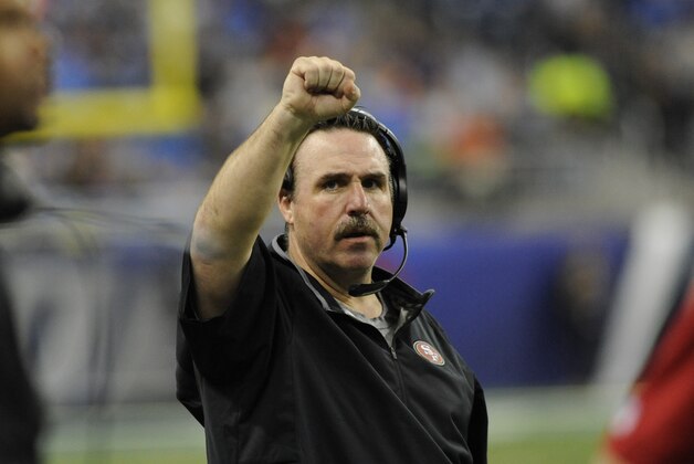 San Francisco 49ers head coach Jim Tomsula signals during the second half of an NFL football game against the Detroit Lions, Sunday, Dec. 27, 2015, in Detroit. (AP Photo/Jose Juarez)