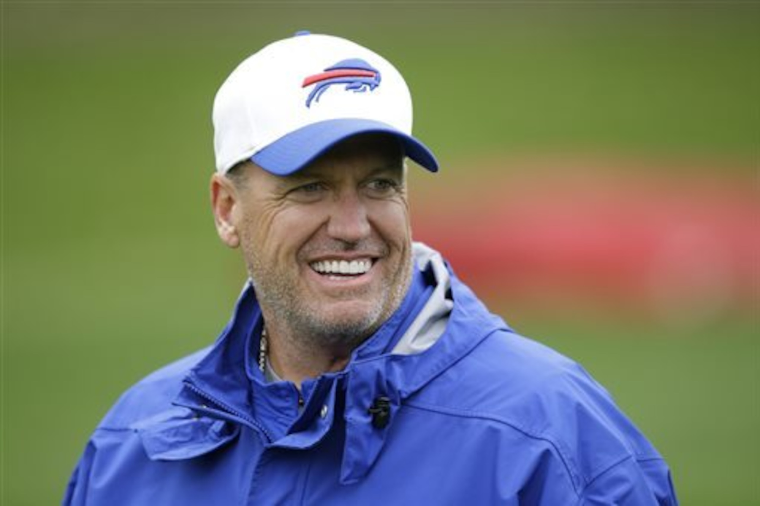 FILE - In this Oct. 22, 2015 file photo, Buffalo Bills head coach Rex Ryan walks off the field at the end of an NFL training session in Chandler's Cross, England. Ryan is preparing to face his former team for the first time since being fired by the New York Jets, and linebacker IK Enemkpali will serve as one of Buffalo's captains on Thursday, Nov. 12. (AP Photo/Matt Dunham, File)