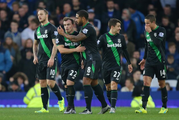 LIVERPOOL, ENGLAND - DECEMBER 28: Xherdan Shaqiri of Stoke City celebrates scoring his team's second goal with his team mates during the Barclays Premier League match between Everton and Stoke City at Goodison Park on December 28, 2015 in Liverpool, England.  (Photo by Dave Thompson/Getty Images)
