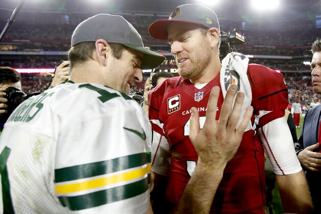 Arizona Cardinals quarterback Carson Palmer (3) greets Green Bay Packers quarterback Aaron Rodgers (12) after an NFL football game, Sunday, Dec. 27, 2015, in Glendale, Ariz. The Cardinals won 38-8. (AP Photo/Rick Scuteri) Arizona Cardinals quarterback Carson Palmer (3) greets Green Bay Packers quarterback Aaron Rodgers (12) after an NFL football game, Sunday, Dec. 27, 2015, in Glendale, Ariz. The Cardinals won 38-8. (AP Photo/Rick Scuteri)
