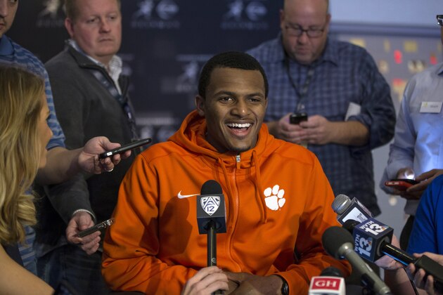 NEW YORK - DECEMBER 11: Heisman finalist Deshaun Watson, quarterback for Clemson University, speaks with reporters during media availability on December 11, 2015 at the Marriott Marquis in New York City. NOTE TO USER: Photographer approval needed for all Commercial License requests. (Photo by Kelly Kline/Getty Images for The Heisman)