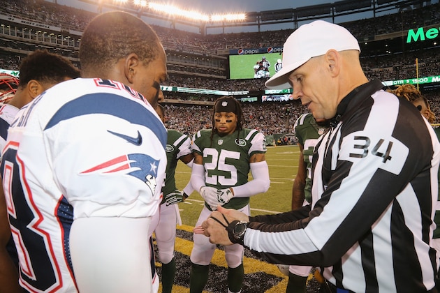 EAST RUTHERFORD, NJ - DECEMBER 27:  Wide Receiver Matthew Slater #18 of the New England Patriots and  Safety Calvin Pryor #25 of the New York Jets participate in the Overtime Coin Toss with Referee Clete Blakeman #34 in the game between the New England Patriots and New York Jets at MetLife Stadium on December 27, 2015 in East Rutherford, New Jersey.  (Photo by Al Pereira/Getty Images for New York Jets)