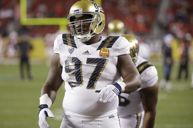 UCLA defensive lineman Kenny Clark (97) during the Foster Farms Bowl NCAA college football game against Nebraska Saturday, Dec. 26, 2015, in Santa Clara, Calif. (AP Photo/Marcio Jose Sanchez)