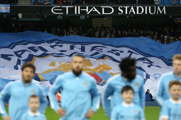 MANCHESTER, ENGLAND - DECEMBER 26:  A new club badge design is displayed by fans during the Barclays Premier League match between Manchester City and Sunderland at the Etihad Stadium on December 26, 2015 in Manchester, England.  (Photo by Jan Kruger/Getty Images)