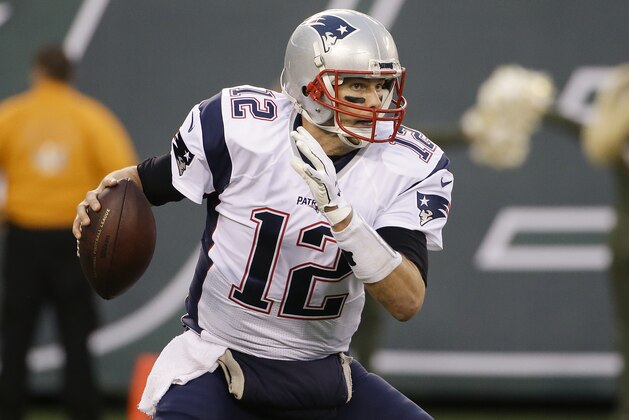 New England Patriots' Tom Brady (12) avoids the rush during the second half of an NFL football game against the New York Jets Sunday, Dec. 27, 2015, in East Rutherford, N.J. (AP Photo/Seth Wenig)