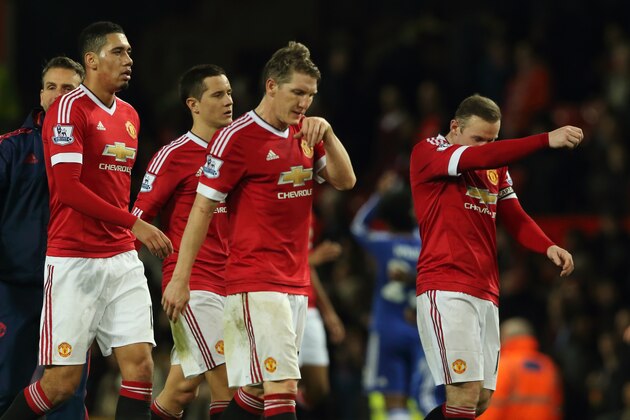 MANCHESTER, ENGLAND - DECEMBER 28:  Wayne Rooney of Manchester United and his team mates walk off after the 0-0 draw in the Barclays Premier League match between Manchester Untied and Chelsea at Old Trafford on December 28, 2015 in Manchester, England.  (Photo by Matthew Ashton - AMA/Getty Images)