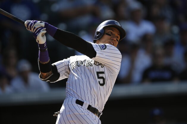 Colorado Rockies' Carlos Gonzalez in the third inning of a baseball game Sunday, Sept. 27, 2015, in Denver. (AP Photo/David Zalubowski)
