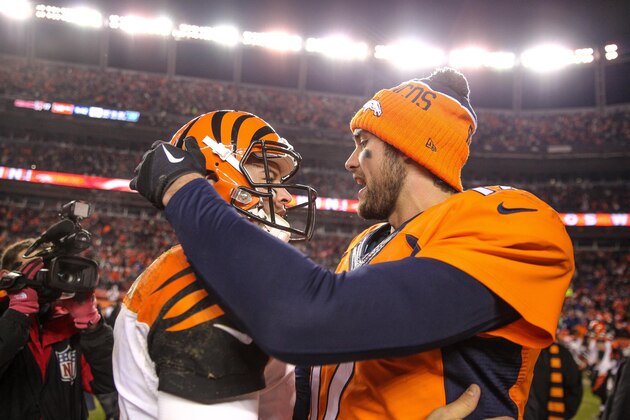 DENVER, CO - DECEMBER 28:  Quarterback Brock Osweiler #17 of the Denver Broncos and quarterback AJ McCarron #5 of the Cincinnati Bengals shake hands on the field after the Broncos 20-17 overtime win at Sports Authority Field at Mile High on December 28, 2015 in Denver, Colorado. (Photo by Justin Edmonds/Getty Images)