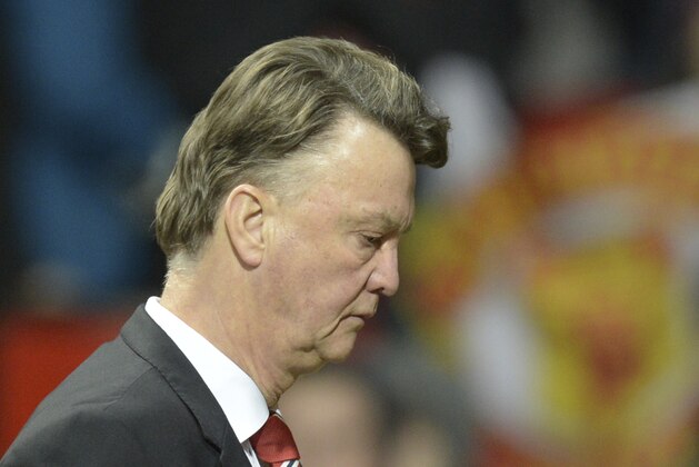 Manchester United's Dutch manager Louis van Gaal leaves the pitch after the final whistle of the English Premier League football match between Manchester United and Chelsea at Old Trafford in Manchester, north west England, on December 28, 2015. AFP PHOTO / OLI SCARFF

RESTRICTED TO EDITORIAL USE. No use with unauthorized audio, video, data, fixture lists, club/league logos or 'live' services. Online in-match use limited to 75 images, no video emulation. No use in betting, games or single club/league/player publications. / AFP / OLI SCARFF        (Photo credit should read OLI SCARFF/AFP/Getty Images)