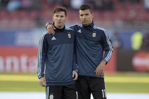 Argentina's forwards Lionel Messi (L) and Sergio Aguero are seen before the start of the 2015 Copa America football championship match against Paraguay, in La Serena, Chile, on June 13, 2015. AFP PHOTO / JUAN MABROMATA        (Photo credit should read JUAN MABROMATA/AFP/Getty Images)