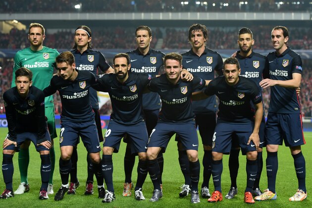 (From topL) Atletico Madrid players, Slovenian goalkeeper Jan Oblak, Brazilian defender Filipe Luis, Spanish midfielder Gabi, Montenegrin defender Stefan Savic, Belgian midfielder Yannick Ferreira Carrasco, Uruguayan defender Diego Godin, Argentinian forward Luciano Vietto, Spanish midfielder Saul Niguez, French forward Antoine Griezmann and Spanish midfielder Koke line up before the UEFA Champions League Group C football match SL Benfica vs Club Atletico de Madrid at the Luz stadium in Lisbon on December 8, 2015.   AFP PHOTO/ FRANCISCO LEONG / AFP / FRANCISCO LEONG        (Photo credit should read FRANCISCO LEONG/AFP/Getty Images)