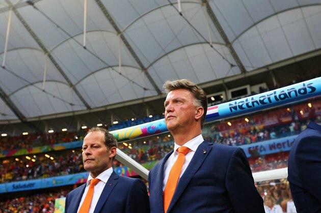 SALVADOR, BRAZIL - JULY 05:  Head Coach, Louis van Gaal (R) and his assistant, Danny Blind stand for the national anthem prior to the 2014 FIFA World Cup Brazil Quarter Final match between the Netherlands and Costa Rica at Arena Fonte Nova on July 5, 2014 in Salvador, Brazil.  (Photo by Dean Mouhtaropoulos/Getty Images)