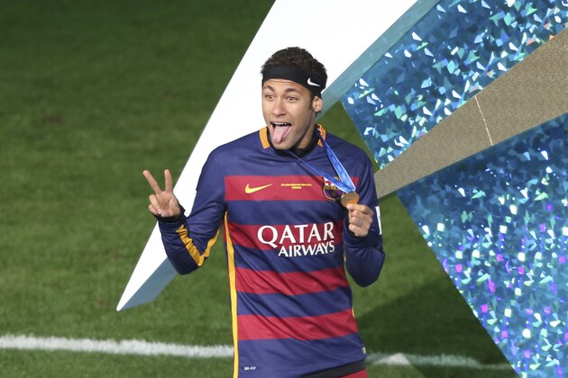 FC Barcelona’s Neymar appears for an award ceremony after his team defeated River Plate 3-0 in their final match at the FIFA Club World Cup soccer tournament in Yokohama, near Tokyo, Sunday, Dec. 20, 2015. (AP Photo/Koji Sasahara)