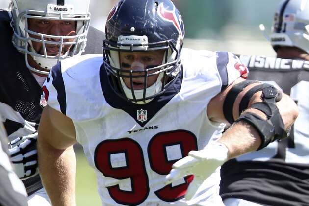 Houston Texans DE #99 JJ Watt action in the second quarter in a game against the Oakland Raiders at the O.co Coliseum at an NFL game in Oakland, Calif. on Sunday Sept. 14, 2014. (AP Photo/David Seelig)