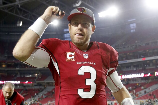 Arizona Cardinals quarterback Carson Palmer (3) leaves the field after an NFL football game against the Green Bay Packers, Sunday, Dec. 27, 2015, in Glendale, Ariz. The Cardinals won 38-8. (AP Photo/Rick Scuteri)
