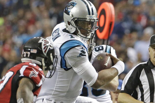 Carolina Panthers quarterback Cam Newton (1) runs against Atlanta Falcons free safety Ricardo Allen (37) during the second half of an NFL football game, Sunday, Dec. 27, 2015, in Atlanta. (AP Photo/David Goldman)